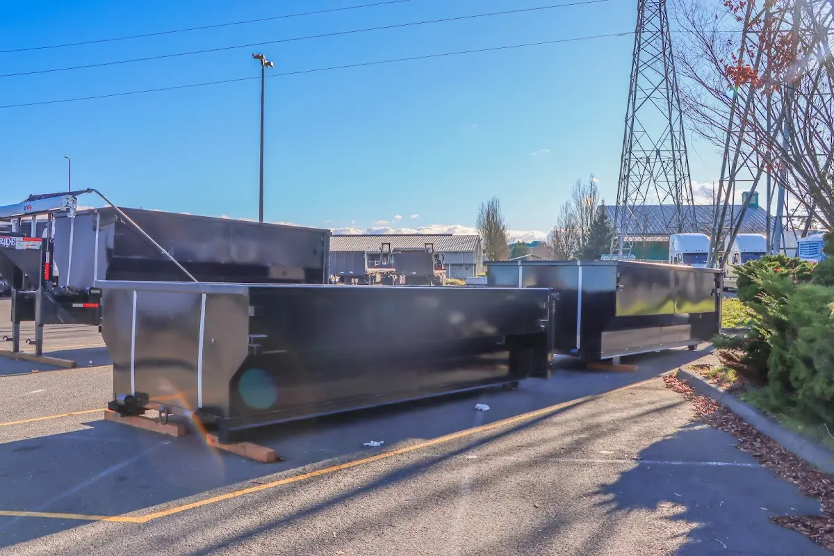 Roll-off dumpster ready for waste disposal at job site for Roofing Dumpster Rental in Kenosha